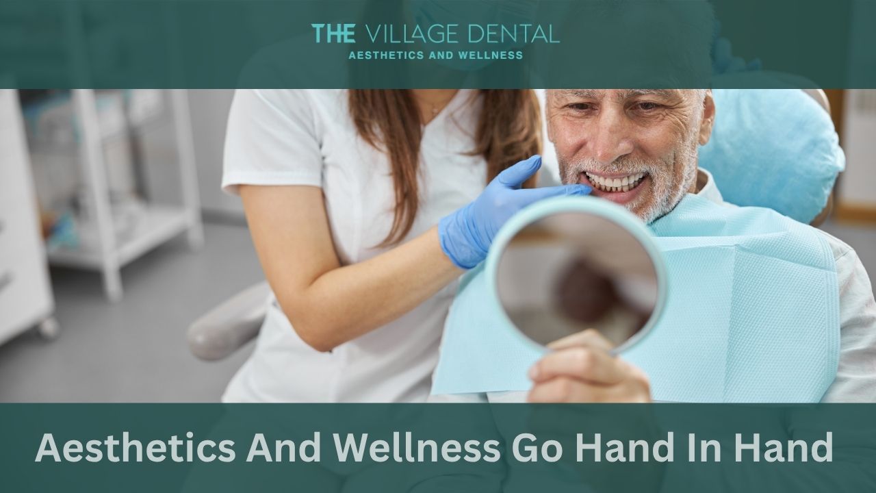 Dentist assisting patient with dental checkup at The Village Dental, emphasizing aesthetics and wellness in oral health care in Pinecrest, FL.