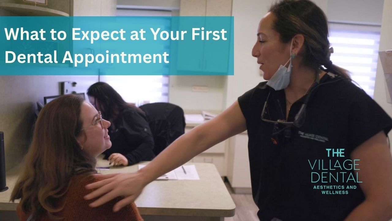 Patient consultation at The Village Dental, Pinecrest, FL, with a dentist discussing first dental appointment expectations, emphasizing personalized care and comfort.