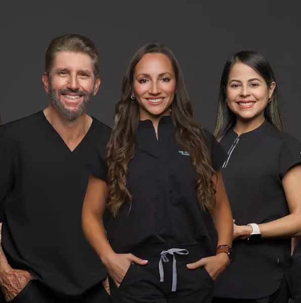 The Village Dental team in Pinecrest, FL, featuring friendly dental professionals dedicated to general, cosmetic, and advanced dental care.